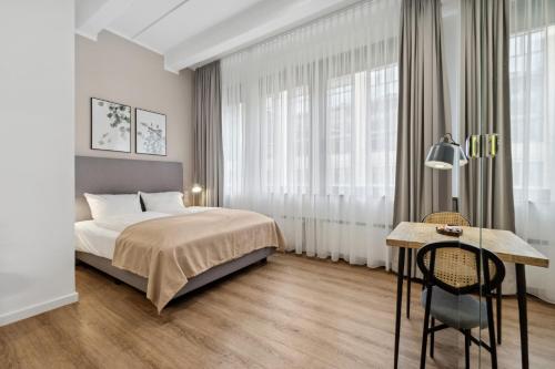 Katil atau katil-katil dalam bilik di Limehome Munich Fritz-Erler Str