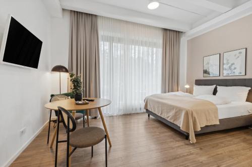 Katil atau katil-katil dalam bilik di Limehome Munich Fritz-Erler Str