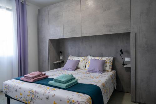 Кровать или кровати в номере Residence la Pace - Pool & Relax