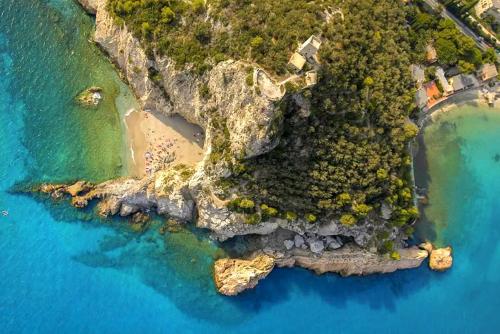 an aerial view of an island in the ocean at La vita è bella - Noli in Noli