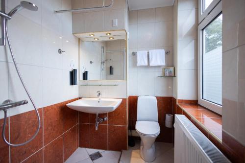 Ванная комната в Milling Hotel Plaza