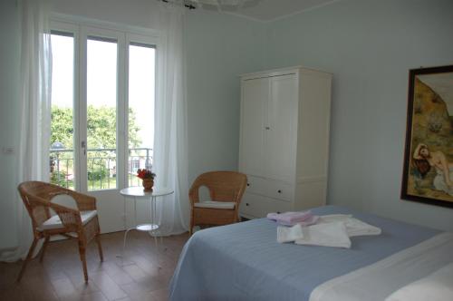 Ένα ή περισσότερα κρεβάτια σε δωμάτιο στο B&B Cherry En Rose
