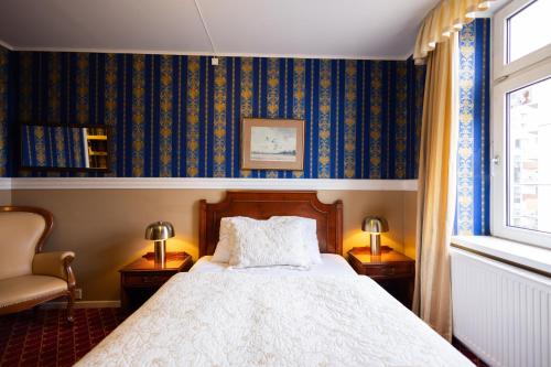 Кровать или кровати в номере Milling Hotel Plaza