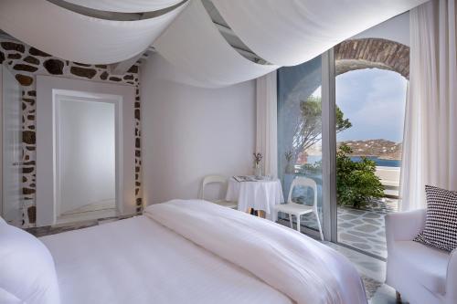 Ένα ή περισσότερα κρεβάτια σε δωμάτιο στο Greco Philia Hotel Boutique