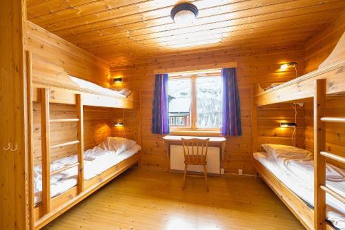 Ένα ή περισσότερα κρεβάτια σε δωμάτιο στο Voss Mountain Lodge