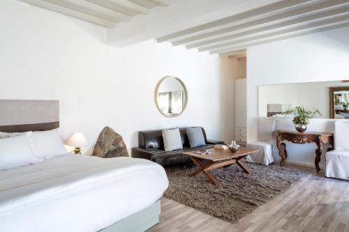Ένα ή περισσότερα κρεβάτια σε δωμάτιο στο Greco Philia Hotel Boutique