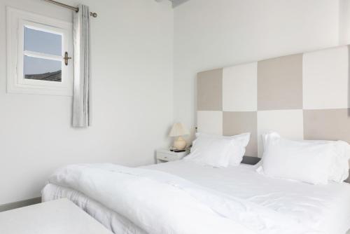 Ένα ή περισσότερα κρεβάτια σε δωμάτιο στο Greco Philia Hotel Boutique