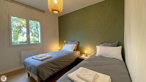 Ένα ή περισσότερα κρεβάτια σε δωμάτιο στο Breakislebed Chambres ou suites dans maison