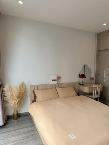 Katil atau katil-katil dalam bilik di CalmCottage