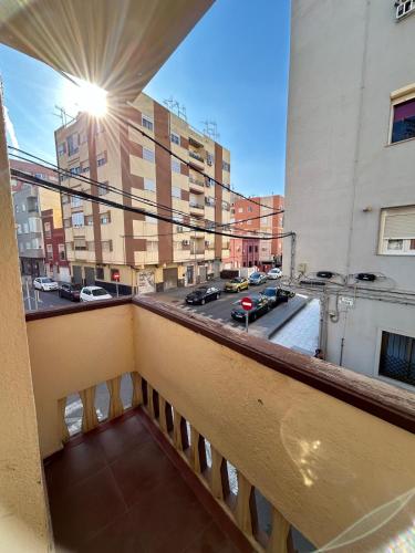 a balcony with a view of a city street at piso en zapillo in Almería