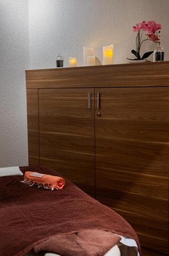 Baron Tavernier Hotel Restaurant & SPAにあるベッド