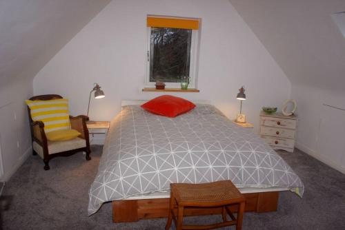 a bedroom with a bed and a desk and a window at Moyard 357 Oak Lodge in Moyard