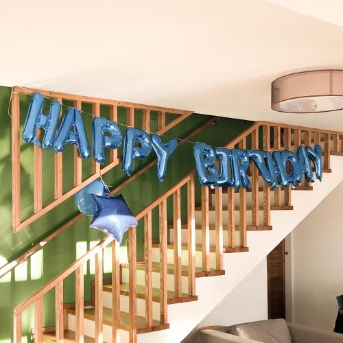 a happy birthday banner on the stairs of a house at Chalet Deluț in Suceava