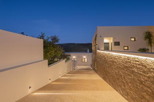 a hallway of a house with a brick wall at Anantia Villa 1 - Scenic View, Luxury Experience in Episkopi (Heraklion)