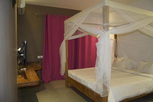 Cama o camas de una habitación en KEPARANGA