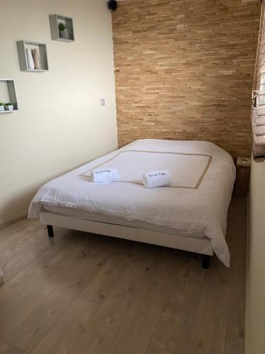 Ένα ή περισσότερα κρεβάτια σε δωμάτιο στο APPARTEMENT SPA