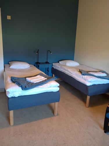 Llit o llits en una habitació de Vandrarhem Dahléns