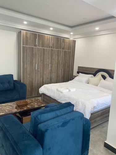 Tempat tidur dalam kamar di Buhe Plaza Guest House