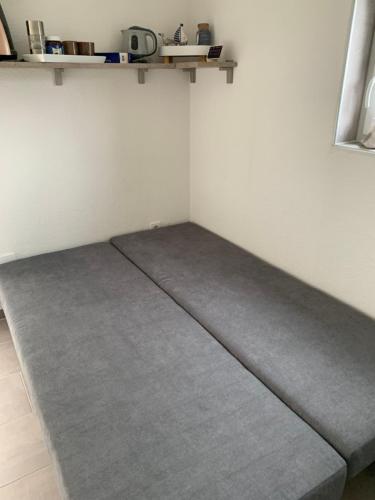 Ein Bett oder Betten in einem Zimmer der Unterkunft Ferienzimmer Balou