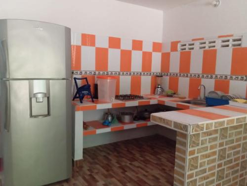 Virtuvė arba virtuvėlė apgyvendinimo įstaigoje Villa del Carmen e hijos