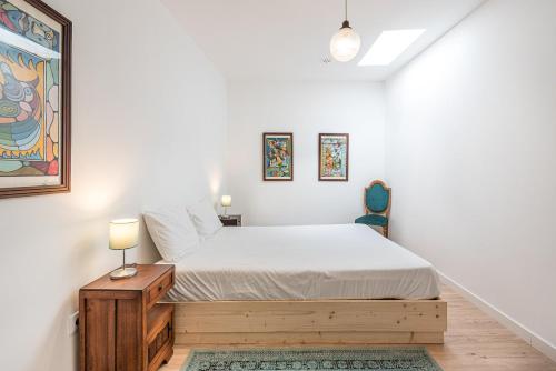 Katil atau katil-katil dalam bilik di GuestReady - Sunset Pool House