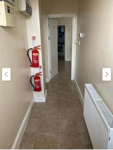 a hallway with two fire hydrants on the wall at 29 ASHBURTON STREET in Stoke on Trent