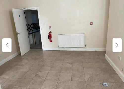 an empty room with a fire hydrant on the wall at 29 ASHBURTON STREET in Stoke on Trent