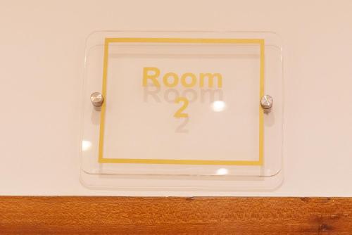 a alarm clock with the word room on it at _ CAVOUR 156 & SAVOIA _ in Bari