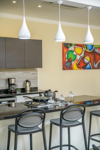 Кухня или мини-кухня в amber Villas - Fahari Residence
