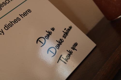 a piece of paper that says happy new year and happy holidays at 't Lytse Knipke in Lemmer
