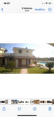 a page of a website with a picture of a house at Luxury B&B Resort in Anzio
