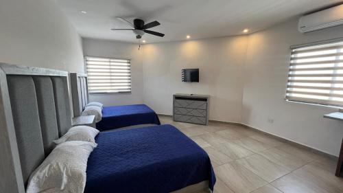 Katil atau katil-katil dalam bilik di Hotel Plazuela