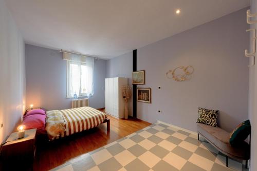 Postel nebo postele na pokoji v ubytování La Violetta di Parma