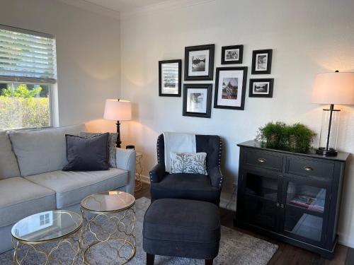 a living room with a couch and a chair at Holiday Isle Yacht Club in Fort Lauderdale