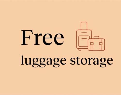 a sign that says free luggage storage and a suitcase at Holečkova Apartments in Prague