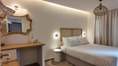 Säng eller sängar i ett rum på Acropolis view apartment
