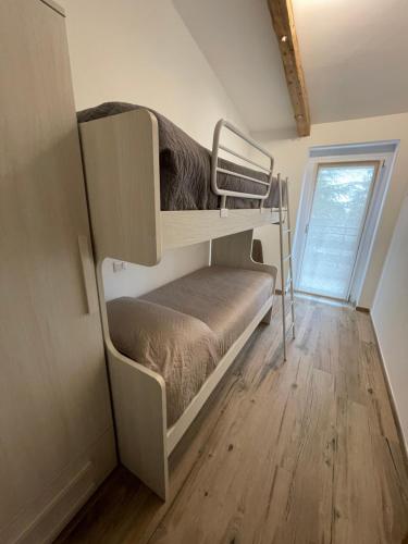 Postel nebo postele na pokoji v ubytování Chalet Torri del Brenta