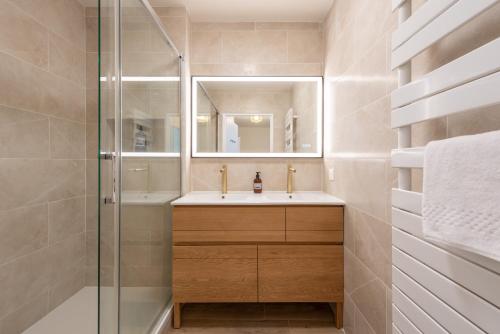 Et badeværelse på Le cinquième ciel - 75m2 avec garage privé