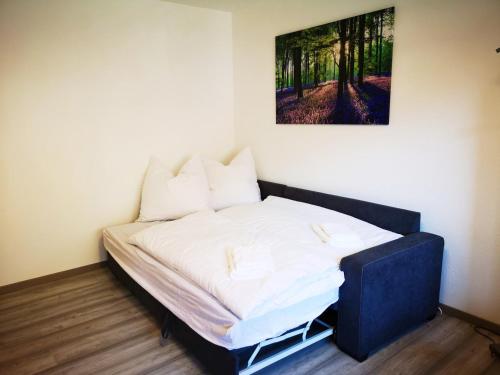 Postel nebo postele na pokoji v ubytování Urlaubsdomizil in Bad Grund - Harz