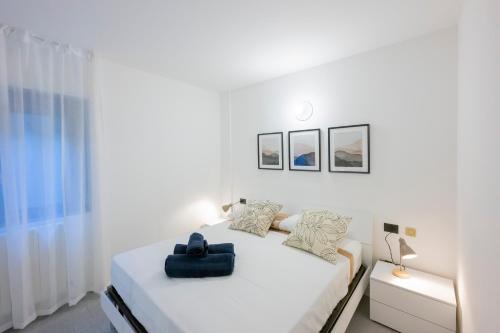 Katil atau katil-katil dalam bilik di Gelsi Apartments Lake Como
