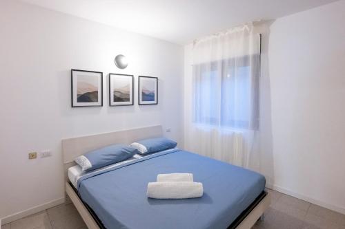Katil atau katil-katil dalam bilik di Gelsi Apartments Lake Como