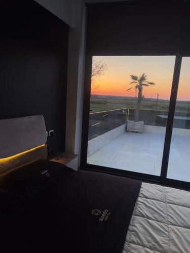 Ένα ή περισσότερα κρεβάτια σε δωμάτιο στο Sueño Luxury Villa