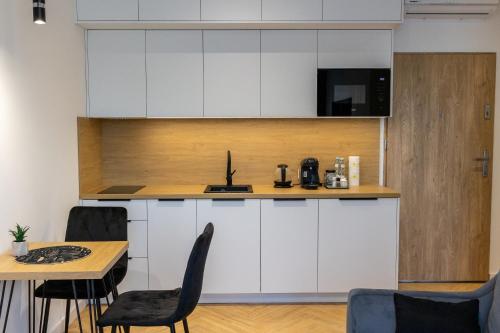 Køkken eller tekøkken på DS Apartamenty Jaśminowa