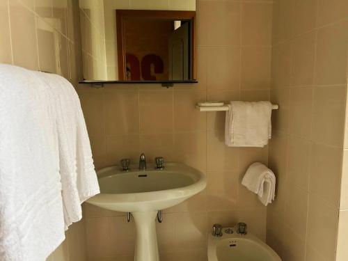Koupelna v ubytování Albergo Mango