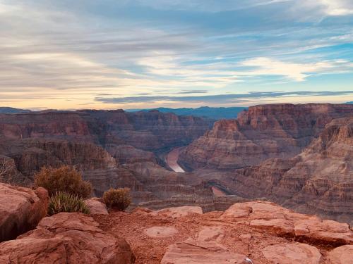 a view of the grand canyon at sunset at Grand Canyon Glamping in Valle