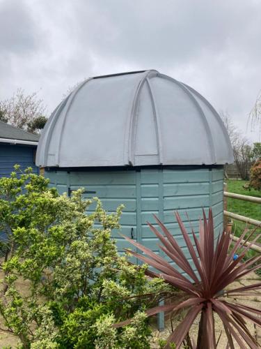 an observatory with a dome on top of it at Moon Pod in Westfield