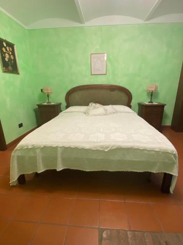La Cassina Room tesisinde bir odada yatak veya yataklar