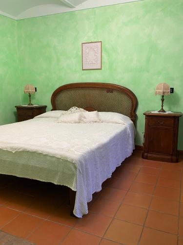 La Cassina Room tesisinde bir odada yatak veya yataklar