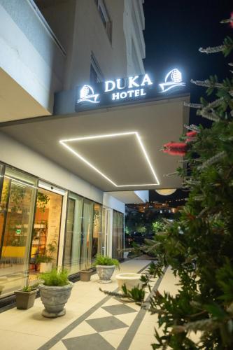 a building with a sign that reads ducia hotel at DUKA Hotel in Vlorë