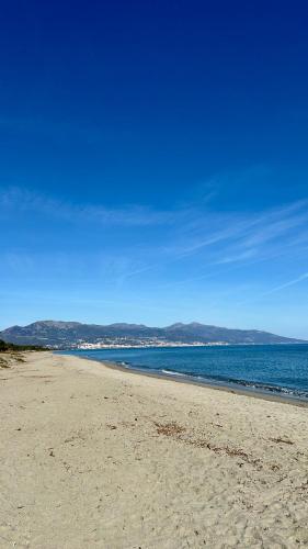 Maison en bord de mer, Plage de la Marana en Corse